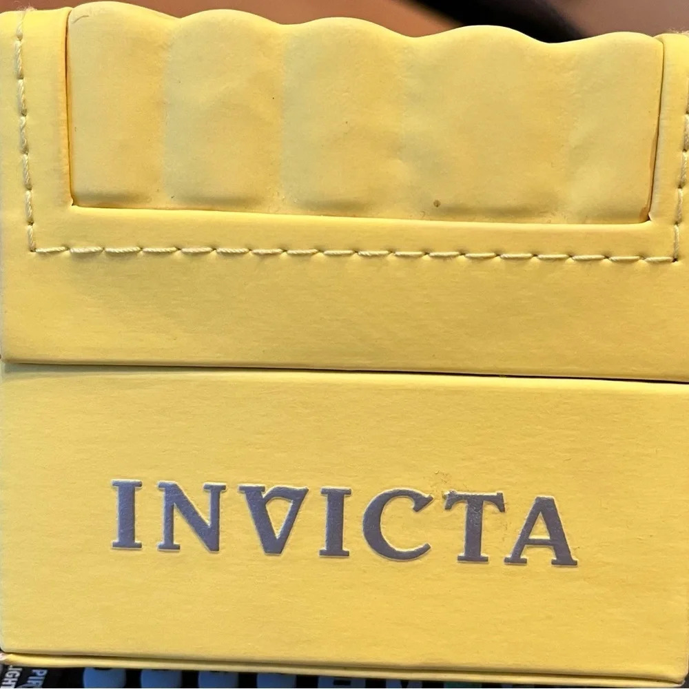 Invicta watch box, yellow.